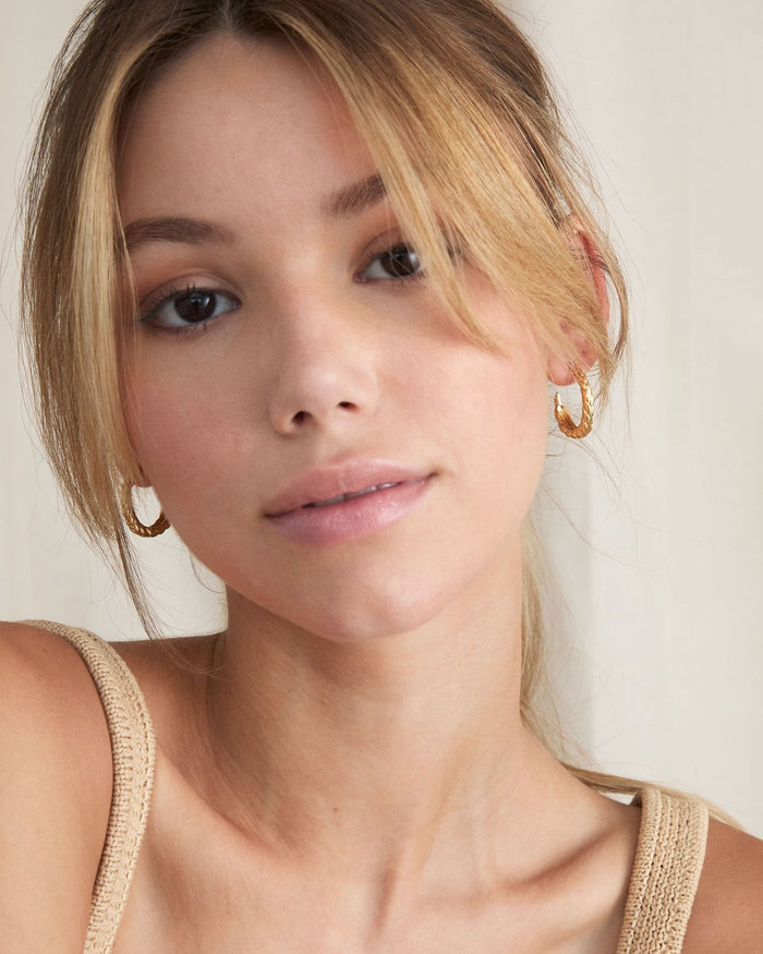 BRYAN ANTHONYS WOVEN BRAIDED HOOP EARRINGS ON MODEL