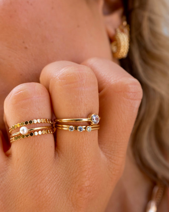 XL Gemma ring stacked with dainty everyday diamond and pearl rings
