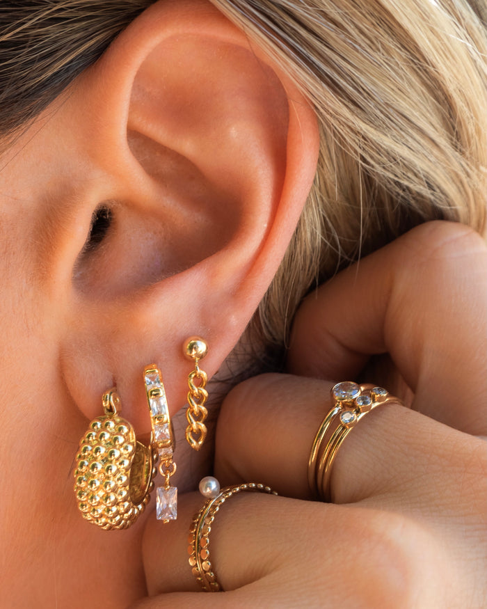 Gold-filled XL Gemma ring shown alongside dainty everyday earring stacks