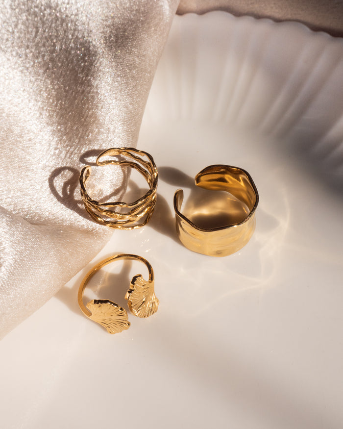 Model wearing the Yule cuff ring with its organic hammered finish